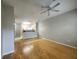 Bright living room with hardwood floors, ceiling fan, and open layout at 870 Mayson Turner Nw Rd # 1228, Atlanta, GA 30314
