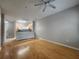 Bright living room with hardwood floors, ceiling fan, and open layout at 870 Mayson Turner Nw Rd # 1228, Atlanta, GA 30314
