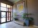 Elegant lobby with tile flooring, plants, seating and access to residences at 870 Mayson Turner Nw Rd # 1228, Atlanta, GA 30314