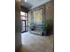 Inviting lobby area with modern artwork, comfortable seating, and tiled floors at 870 Mayson Turner Nw Rd # 1228, Atlanta, GA 30314