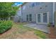 The backyard has a small patio and partial fence, offering a private outdoor space at 2638 Village Park Bnd, Duluth, GA 30096