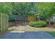 A fenced backyard with mature trees at 2638 Village Park Bnd, Duluth, GA 30096