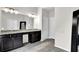 Bathroom includes double sinks, and a large mirror at 2638 Village Park Bnd, Duluth, GA 30096