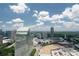 Beautiful skyline view on a sunny day with buildings and parking lots at 3475 Oak Valley Ne Rd # 910, Atlanta, GA 30326