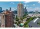 Stunning aerial view of the Oaks Buckhead community with high-rise buildings and a refreshing pool at 3475 Oak Valley Ne Rd # 910, Atlanta, GA 30326