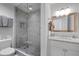 Bright bathroom featuring a glass shower, modern vanity, and neutral color palette at 3475 Oak Valley Ne Rd # 910, Atlanta, GA 30326