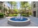 Picturesque courtyard with a charming water fountain at The Oaks Buckhead at 3475 Oak Valley Ne Rd # 910, Atlanta, GA 30326