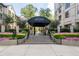 Elegant entrance to The Oaks Buckhead featuring manicured landscaping and a welcoming gate at 3475 Oak Valley Ne Rd # 910, Atlanta, GA 30326