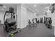 Well-equipped gym with various exercise machines and weights for a full-body workout at 3475 Oak Valley Ne Rd # 910, Atlanta, GA 30326