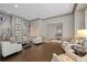 Beautiful lobby with comfortable seating, built-in shelving, and hardwood floors at 3475 Oak Valley Ne Rd # 910, Atlanta, GA 30326