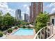 Refreshing community pool with comfortable lounge chairs at The Oaks Buckhead at 3475 Oak Valley Ne Rd # 910, Atlanta, GA 30326