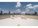 Spacious rooftop deck with lounge chairs and cityscape views at 3475 Oak Valley Ne Rd # 910, Atlanta, GA 30326