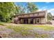 A home featuring a back porch and patio at 3999 Phils Ct, Tucker, GA 30084