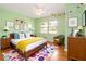 Stylish bedroom with hardwood flooring, bright decor, and a ceiling fan at 3999 Phils Ct, Tucker, GA 30084