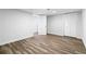 This bedroom offers attractive wood-look floors and a closet at 3999 Phils Ct, Tucker, GA 30084