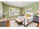 Cozy bedroom featuring a comfy bed and coordinated decor at 3999 Phils Ct, Tucker, GA 30084