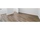 Spacious bedroom featuring wood-look floors and multiple entrances at 3999 Phils Ct, Tucker, GA 30084