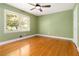 Bedroom with hardwood flooring and natural light at 3999 Phils Ct, Tucker, GA 30084