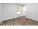 Cozy bedroom with hardwood floors and a window providing natural light at 3999 Phils Ct, Tucker, GA 30084