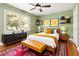 Nicely decorated bedroom featuring a bed and coordinated decor at 3999 Phils Ct, Tucker, GA 30084