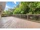 Large deck overlooks the backyard, perfect for outdoor gatherings and relaxing at 3999 Phils Ct, Tucker, GA 30084