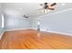 Bright living room featuring hardwood floors, recessed lighting, and ceiling fans at 3999 Phils Ct, Tucker, GA 30084