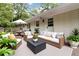 Relax on the patio with comfortable seating and peaceful outdoor view at 3999 Phils Ct, Tucker, GA 30084