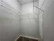 Walk-in closet with wire shelving and carpeted floor at 870 Mayson Turner Nw Rd # 1238, Atlanta, GA 30314