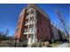 Brick building with multiple balconies, offering an urban living experience at 870 Mayson Turner Nw Rd # 1238, Atlanta, GA 30314