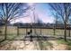 View of a fenced, grassy area with mature trees, showcasing the outdoor space at 870 Mayson Turner Nw Rd # 1238, Atlanta, GA 30314
