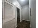Hallway with carpet and access to storage and other rooms at 870 Mayson Turner Nw Rd # 1238, Atlanta, GA 30314