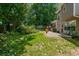 This large backyard has green grass and great entertaining space at 1115 Manor Nw Way, Kennesaw, GA 30144