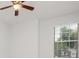 Bedroom featuring a ceiling fan and large window at 1115 Manor Nw Way, Kennesaw, GA 30144