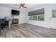 Spacious living room featuring a fireplace and outdoor access at 1115 Manor Nw Way, Kennesaw, GA 30144
