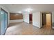Spacious basement with tile flooring, sliding glass doors, and ample room for activities at 3038 Skidaway Ct, Stone Mountain, GA 30087