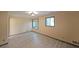 Bedroom with wood-look floors, overhead lighting and views from two windows at 3038 Skidaway Ct, Stone Mountain, GA 30087