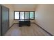 Well-lit office featuring a dark desk and a large window with natural light at 3038 Skidaway Ct, Stone Mountain, GA 30087