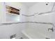 Stylish bathroom showcasing a soaking tub, tiled walls, and modern fixtures at 44 Aberdeen St, Atlanta, GA 30307