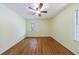 Bright bedroom featuring hardwood floors, a ceiling fan, and bright windows at 44 Aberdeen St, Atlanta, GA 30307
