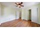 Charming bedroom features hardwood floors, closet, and ceiling fan providing modern comfort at 44 Aberdeen St, Atlanta, GA 30307