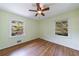 Bright bedroom with hardwood floors, ceiling fan, and large windows that provide lots of natural light at 44 Aberdeen St, Atlanta, GA 30307