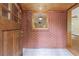 Inviting foyer featuring brick accents and tile flooring, showcasing the home's unique character at 44 Aberdeen St, Atlanta, GA 30307