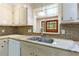 Close-up of a modern kitchen featuring sleek stainless steel appliances and granite countertops at 44 Aberdeen St, Atlanta, GA 30307