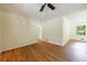 Cozy living room featuring hardwood floors, a ceiling fan, and neutral walls at 44 Aberdeen St, Atlanta, GA 30307