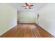 Sun-lit living room with polished hardwood floors, ceiling fan, and a cozy atmosphere at 44 Aberdeen St, Atlanta, GA 30307