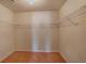 Spacious walk-in closet featuring white shelving to maximize storage potential at 7347 Moss Stone Dr, Conyers, GA 30094