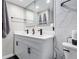 Modern bathroom features dual sinks, black fixtures, and framed vanity mirrors at 1280 W Peachtree W St, Atlanta, GA 30309