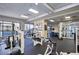 Well-equipped gym featuring modern exercise equipment and a mirrored wall at 1280 W Peachtree W St, Atlanta, GA 30309