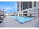 Outdoor pool with plenty of seating and stunning city views at 1280 W Peachtree W St, Atlanta, GA 30309