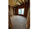 Bedroom framed with a large window and rough flooring ready for a personalized touch at 314 Fortune Ne St # A, Atlanta, GA 30312